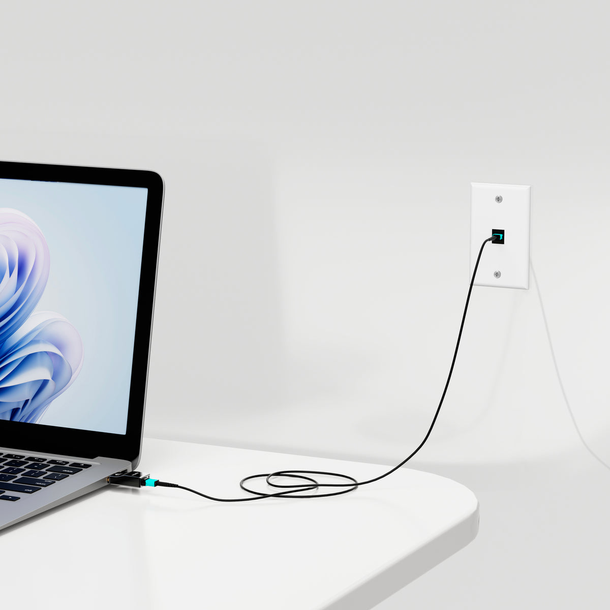 In-wall HDMI fiber extension using RUIPRO MPO keystone wall plate for home or office setups.